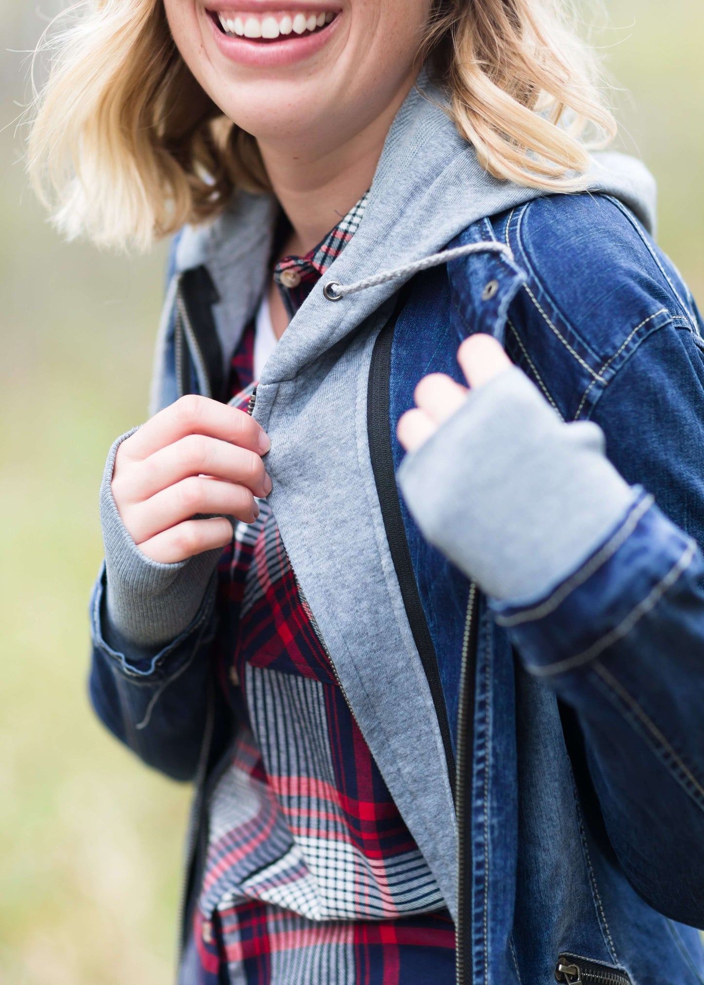 Denim front-zip jacket with removable gray front liner and hood.