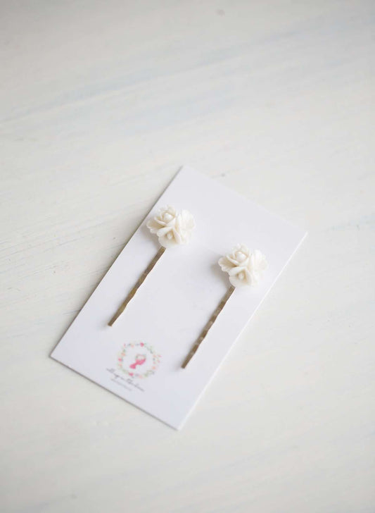 We love these classic, Black Druzy Bobby Pins! These make a fun addition to your hair for small bursts of style. You will find these make a great gift too!