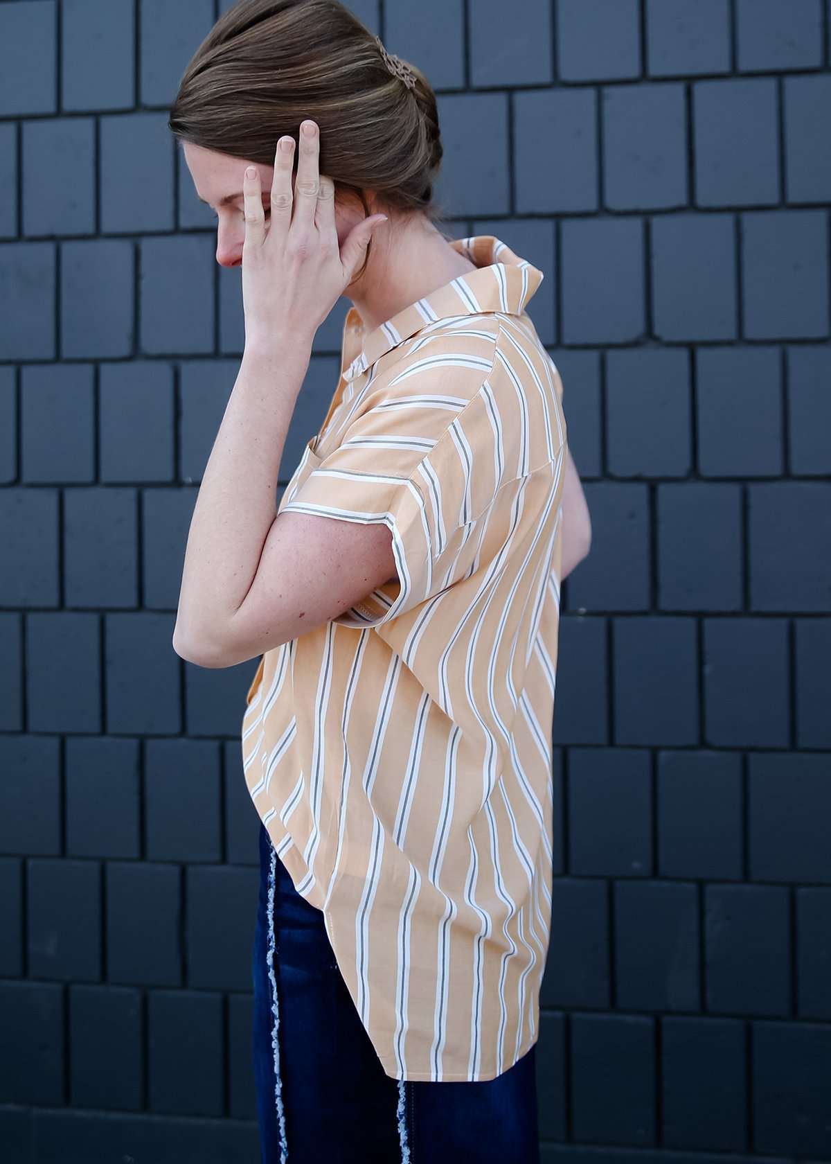 Modest women's button down collared mustard striped top