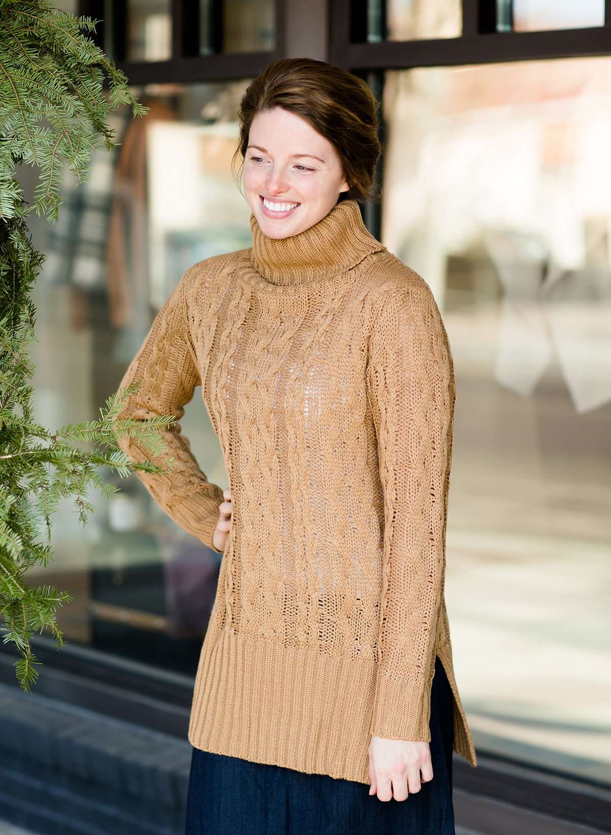 camel colored turtleneck sweater