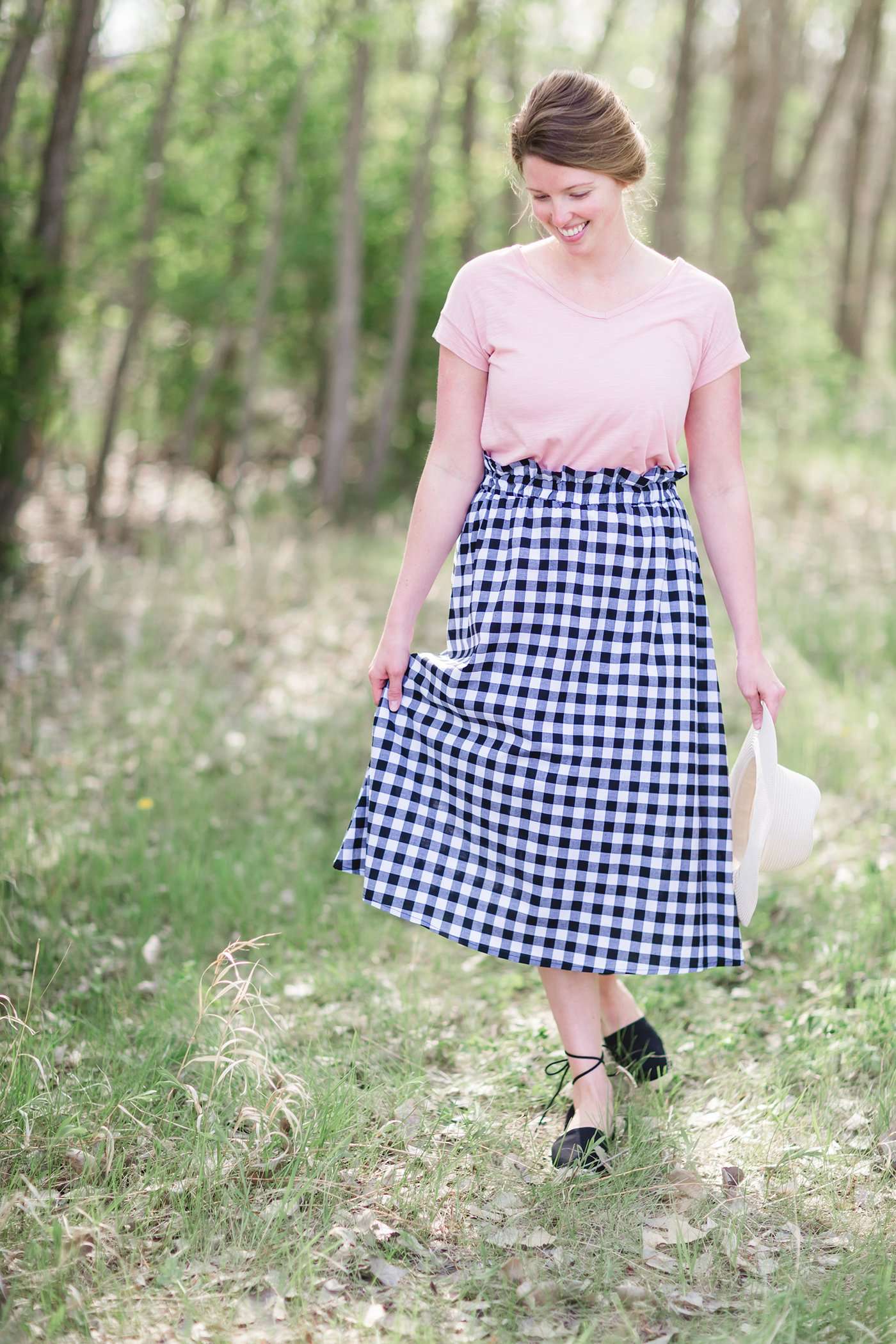 Black and white checkered below the knee skirt with elastic ruffle waistband.