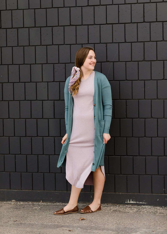 jade colored long double pocket button up cardigan