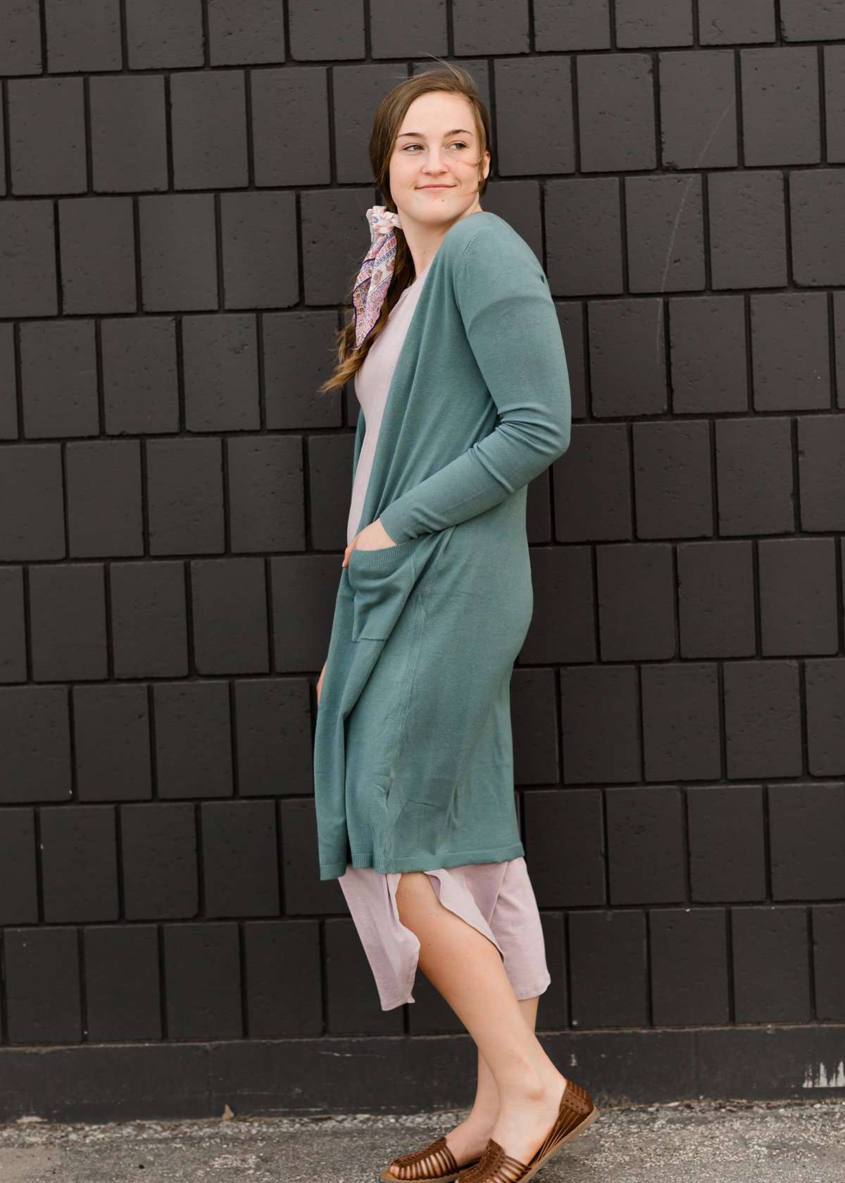 jade colored long double pocket button up cardigan