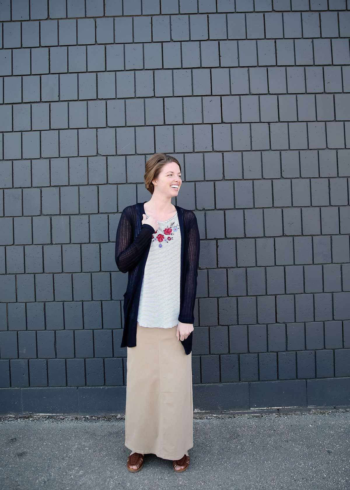 modest women wearing a black and white striped embroidered floral tank top