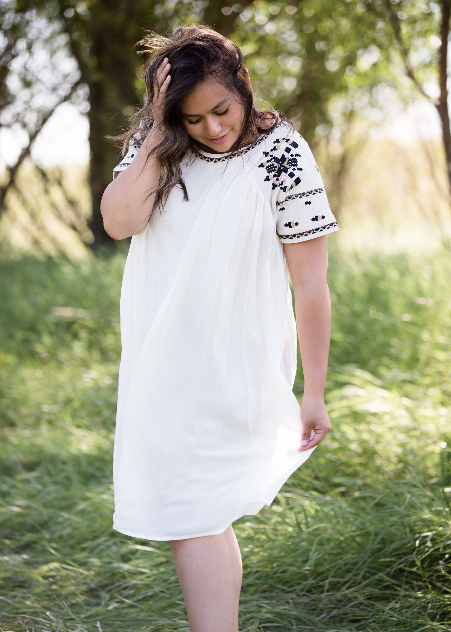 oatmeal colored flowy embroidered midi dress