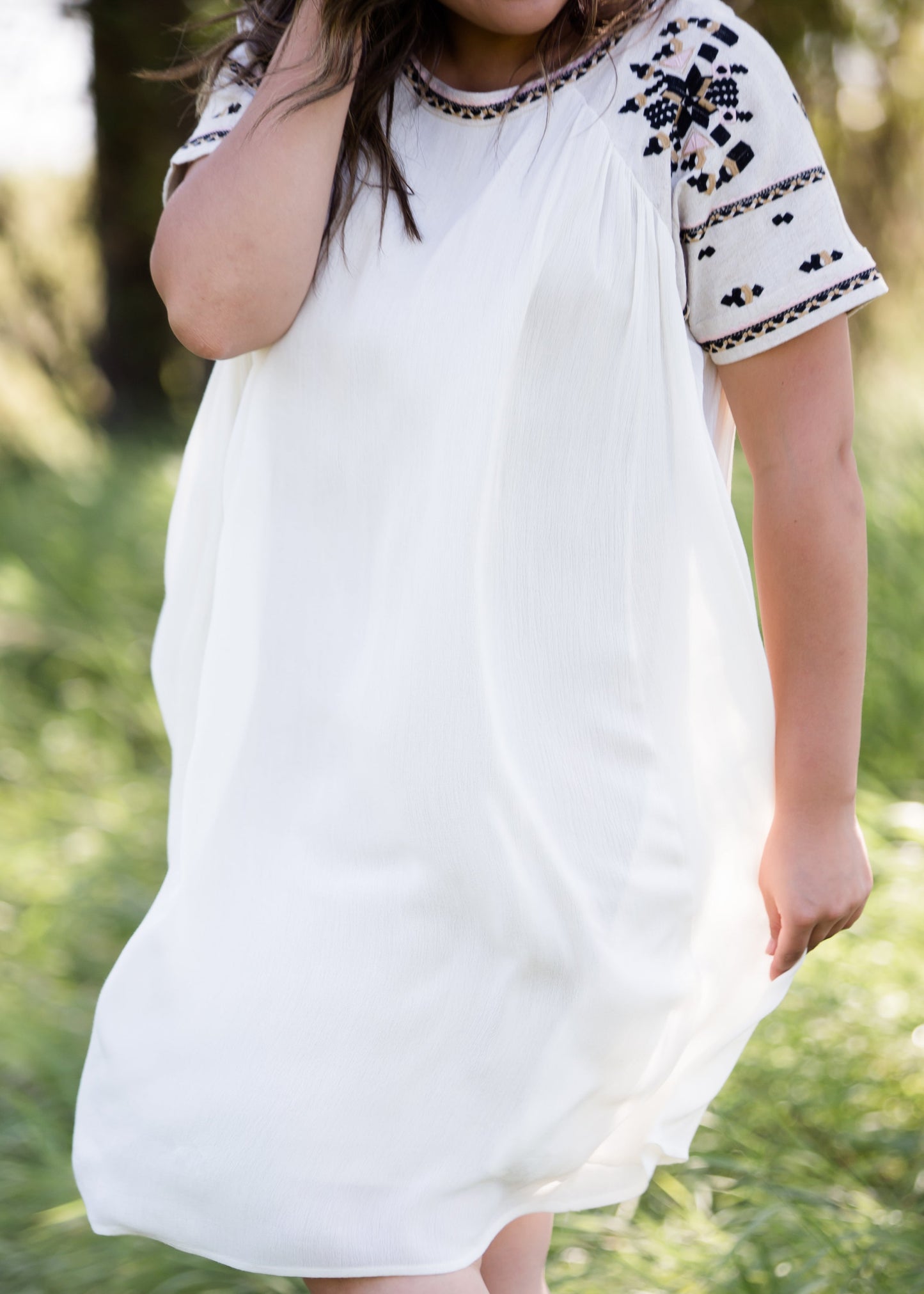 oatmeal colored flowy embroidered midi dress