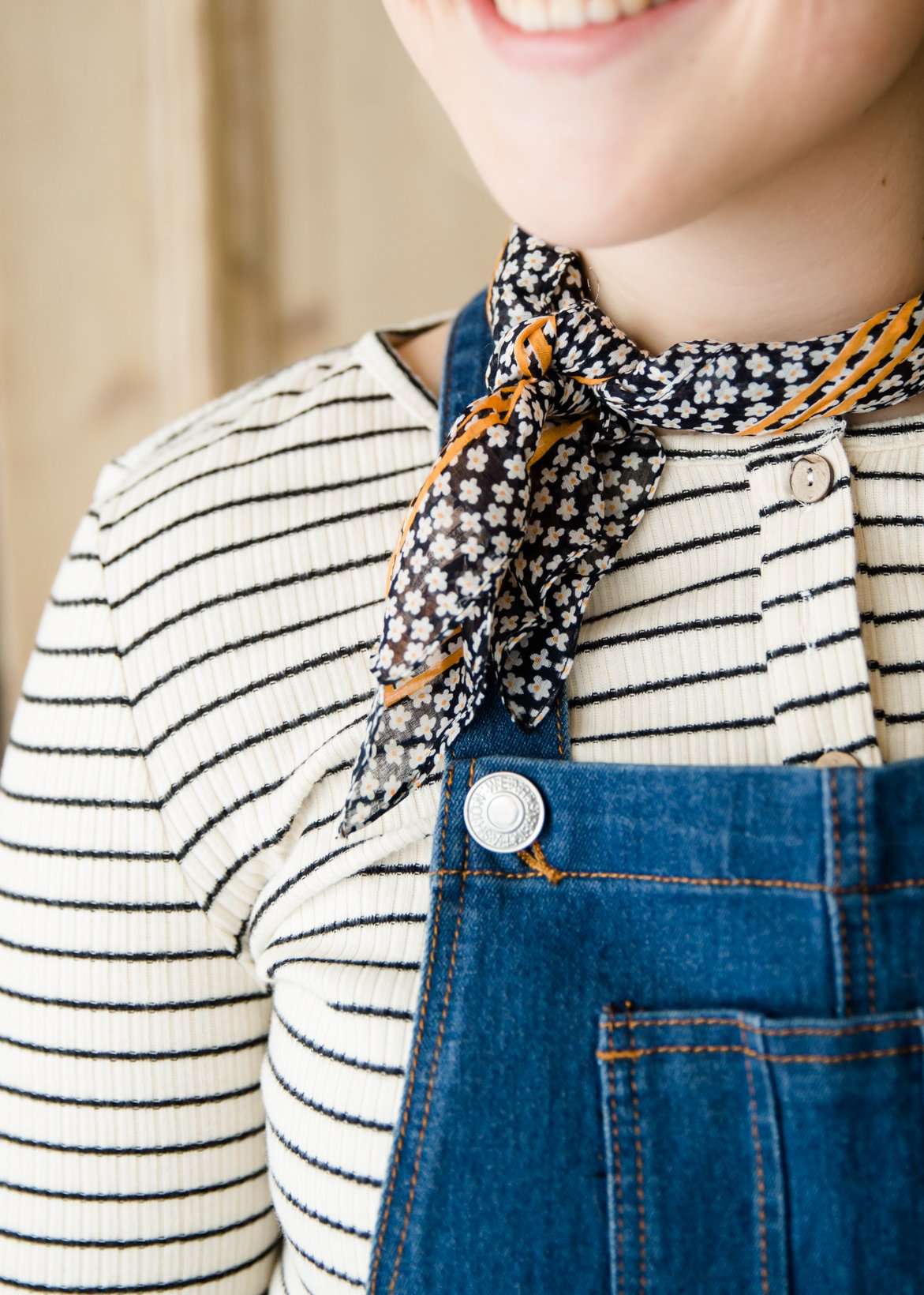 black, white and yellow bandana scarf as a belt