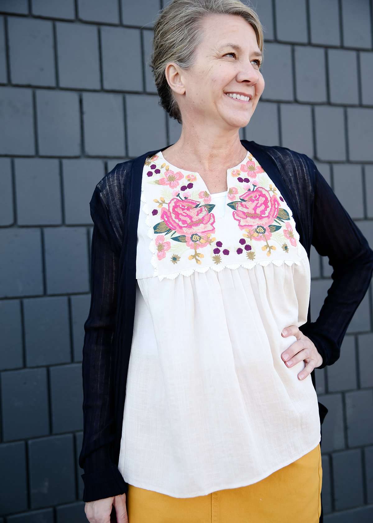 Floral embroidered smocked white top