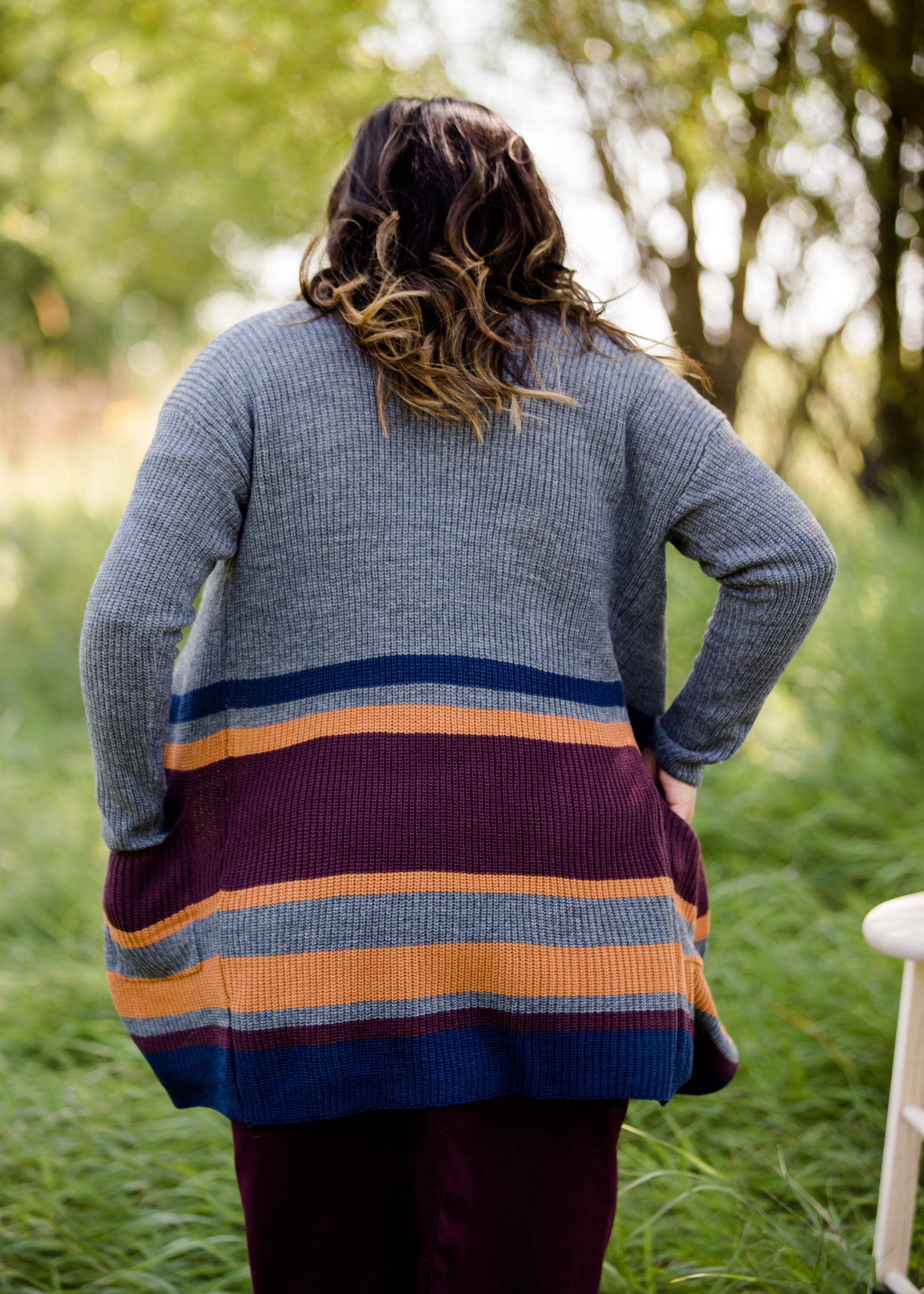 Long knit charcoal womens cardigan with orange and burgundy stripes