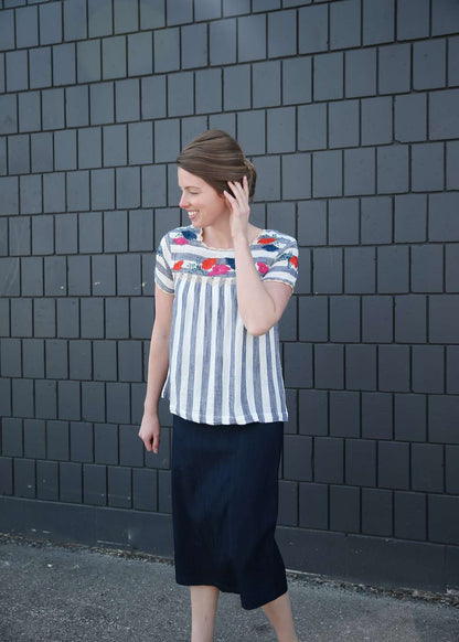 women's modest blue and white striped top with embroidered flowers