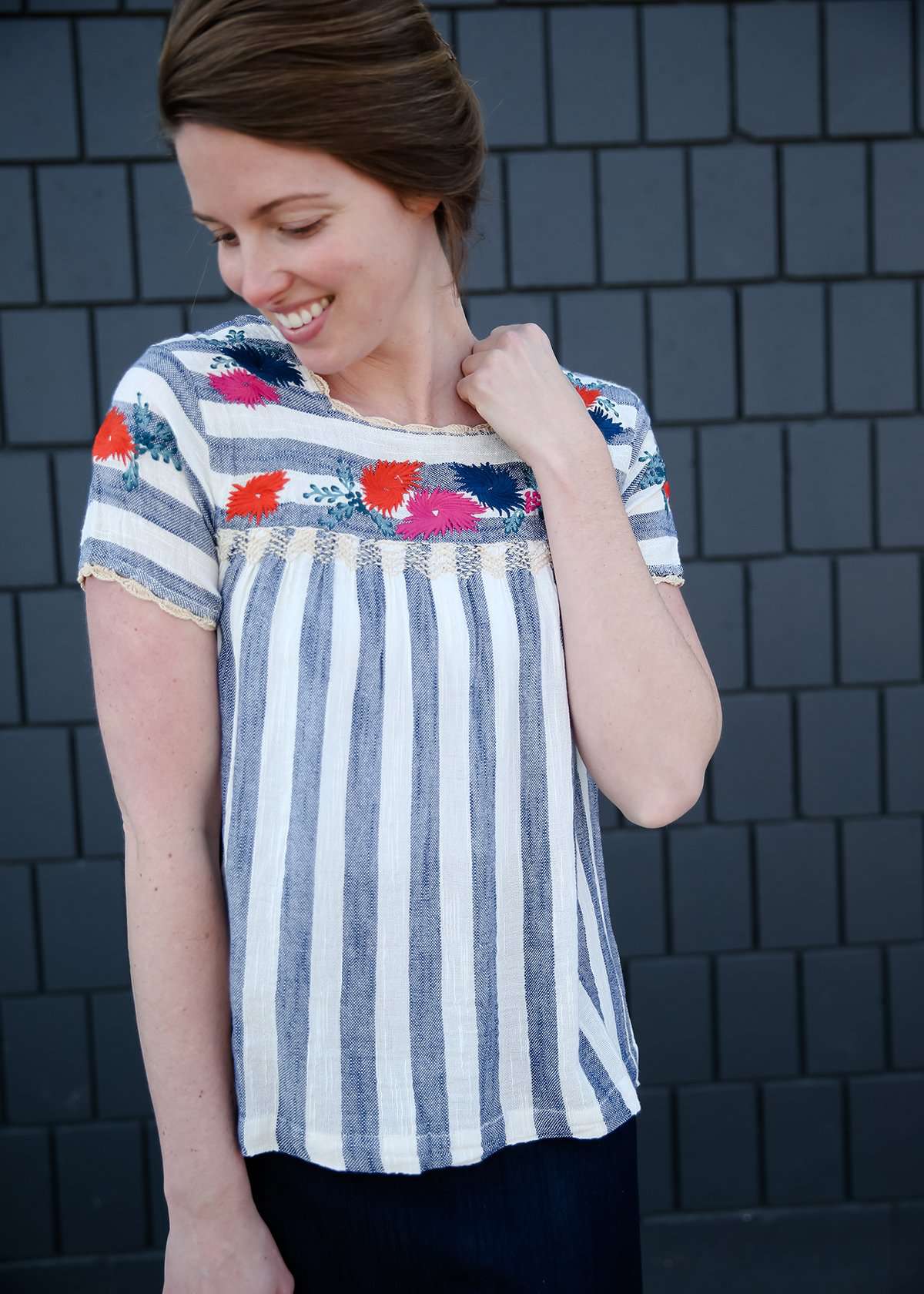 women's modest blue and white striped top with embroidered flowers