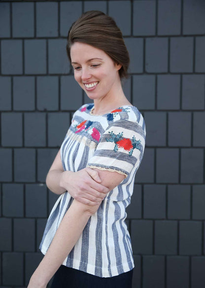 women's modest blue and white striped top with embroidered flowers