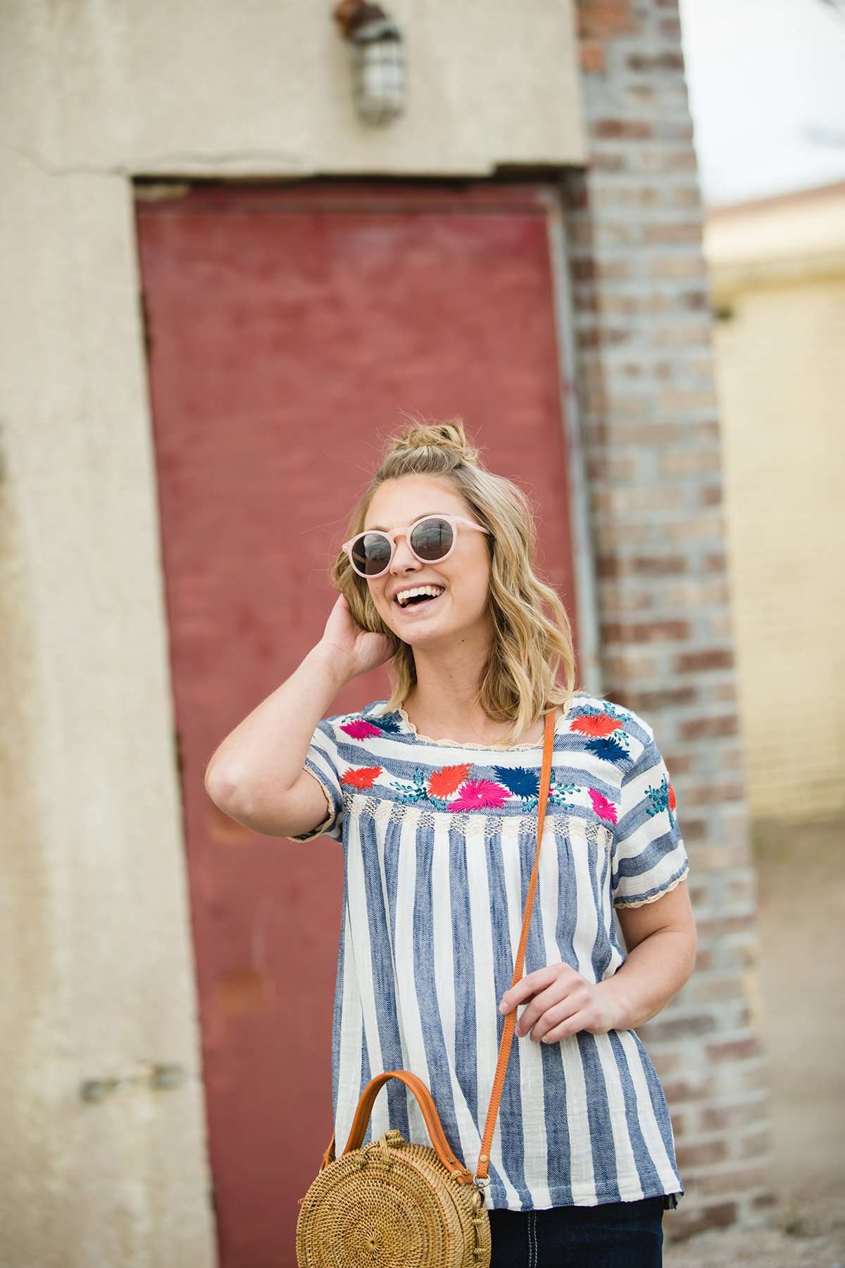 women's modest blue and white striped top with embroidered flowers