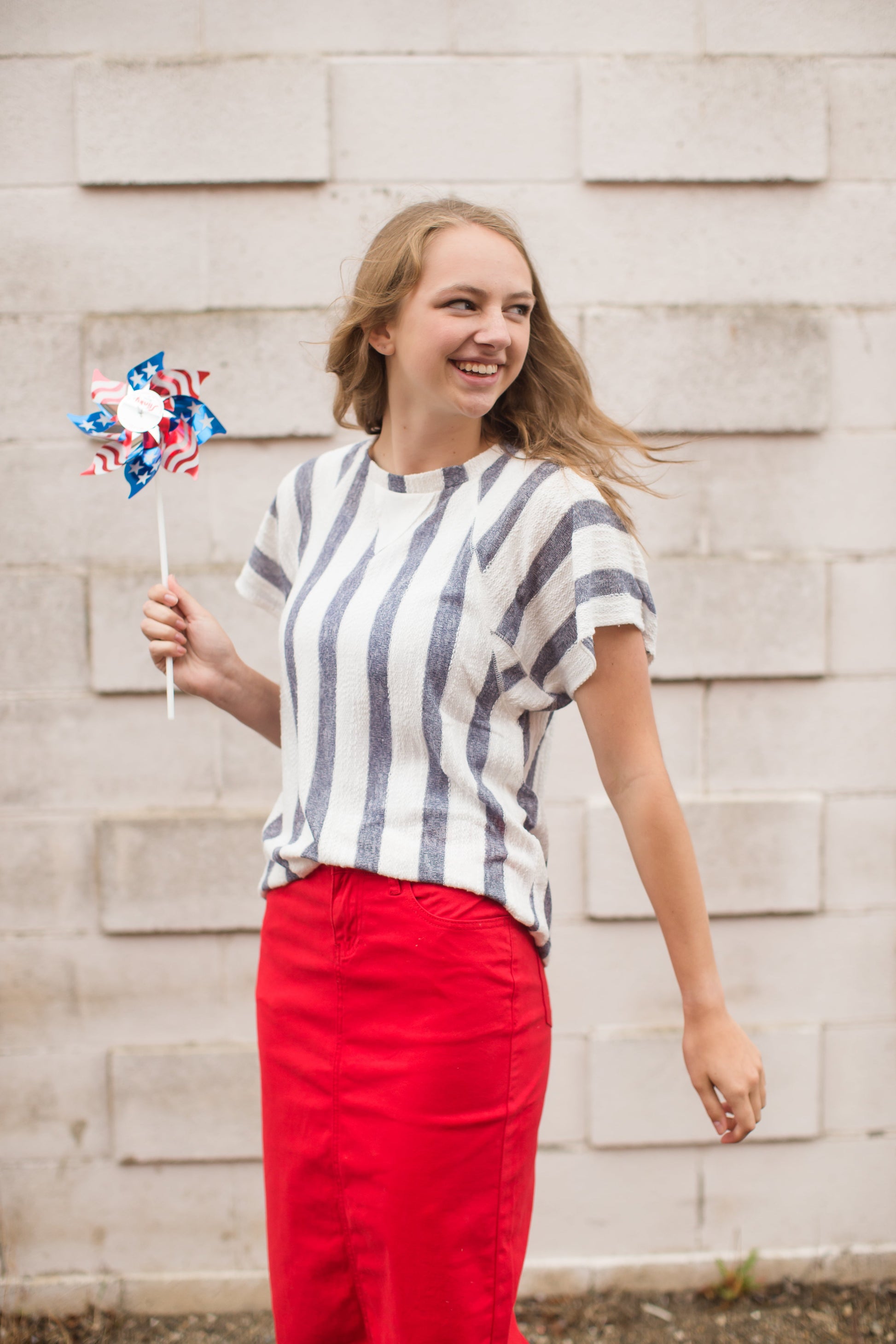 blue and white striped knit top